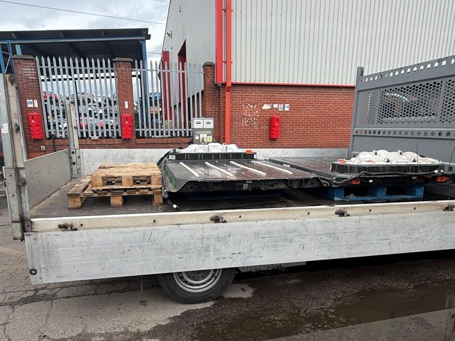 EV battery packs loaded for collection on an Allye flatbed
